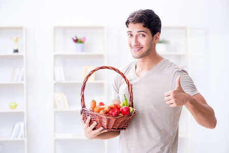 Young man in healthy eating and dieting conceptの写真素材