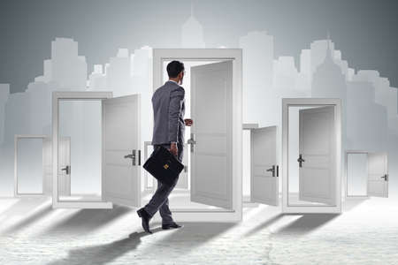 Businessman facing many business opportunitiesの写真素材