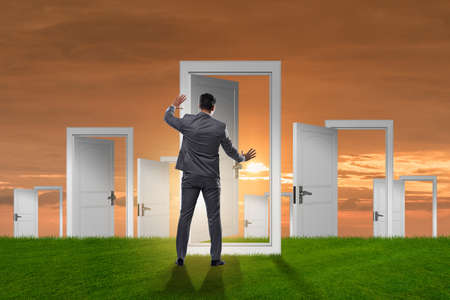 Businessman facing many business opportunitiesの写真素材