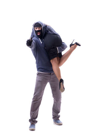 Businesswoman is kidnapped by the gunmanの写真素材