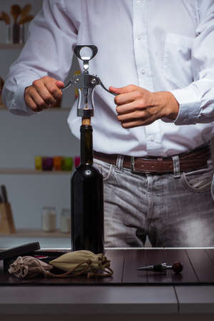 Professional sommelier tasting wine in restaurantの写真素材