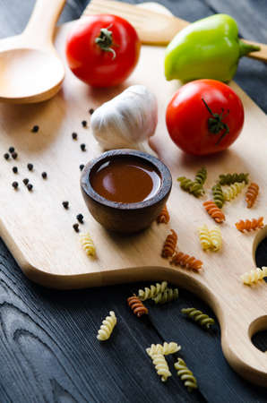 Ingredients ready for italian pasta sauceの写真素材