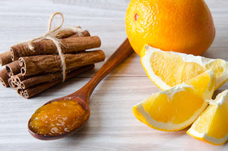 Orange jam served in spoon on the tableの写真素材