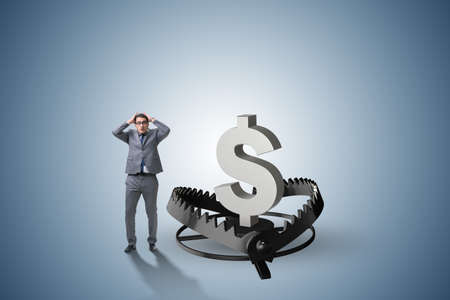 Businessman being trapped by dollarの写真素材