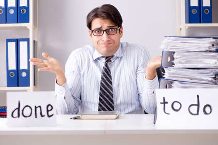 Businessman failing to deliver his to-do list