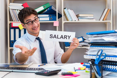 Busy frustrated businessman angry in the officeの写真素材