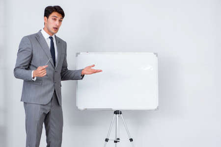 Business presentation in the office with man and womanの写真素材