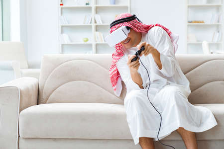 Arab man addicted to video gamesの写真素材