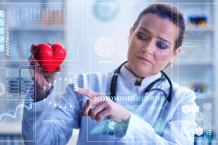 Woman doctor in telemedicine cardiology conceptの写真素材