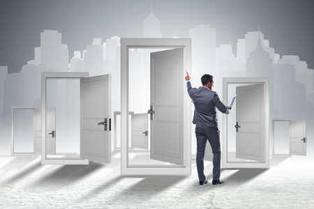 Businessman facing many business opportunitiesの写真素材