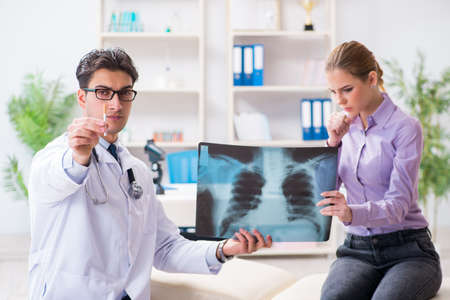 Doctor examining x-ray images of patient