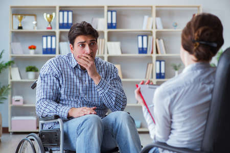 Patient visiting psychotherapist to deal with consequences of trの写真素材