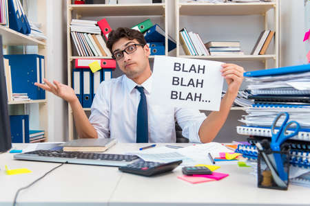 Busy frustrated businessman angry in the officeの写真素材