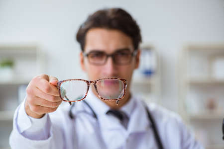 Eye doctor in medical concept