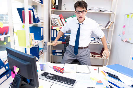 Busy frustrated businessman angry in the officeの写真素材