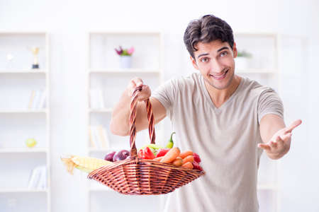 Young man in healthy eating and dieting conceptの写真素材