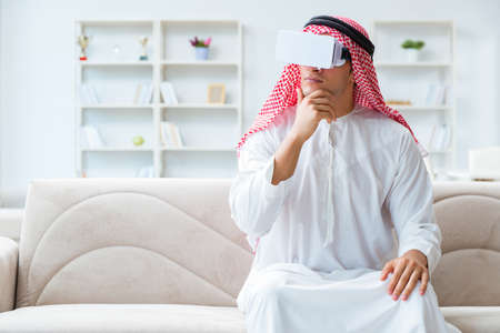 Arab man with virtual reality glassesの写真素材
