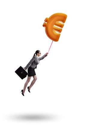 Businesswoman flying on euro sign inflatable balloonの写真素材