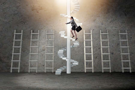 Career progression concept with ladders and staircaseの写真素材