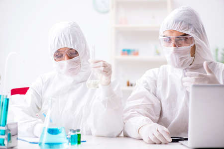 Two chemists working in the labの写真素材
