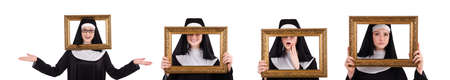 Young nun with frame isolated on whiteの写真素材