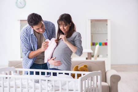 Young parents expecting their first babyの写真素材