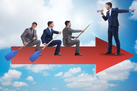 Businessman on line chart in business conceptの写真素材