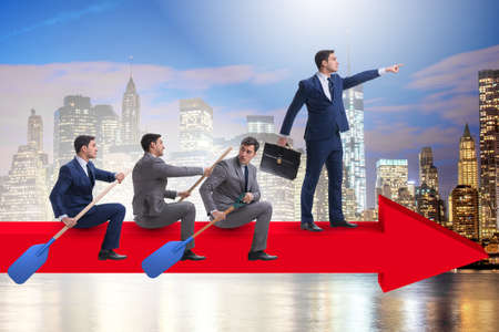 Businessman on line chart in business conceptの写真素材