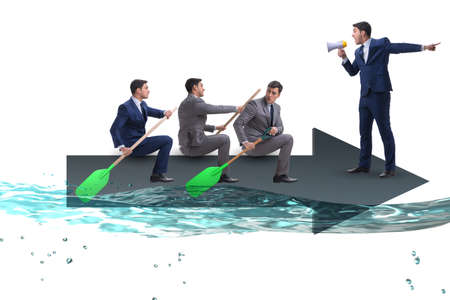 Teamwork concept with businessmen on boatの写真素材