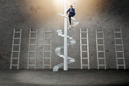 Career progression concept with ladders and staircaseの写真素材