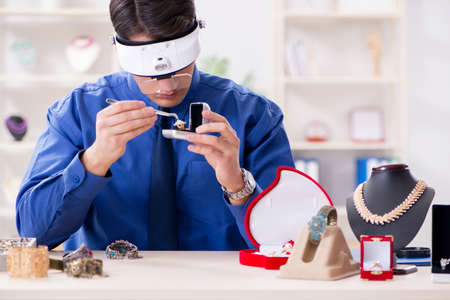 Jeweler working with luxury jewelry in the workshop