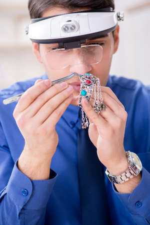 Jeweler working with luxury jewelry in the workshop