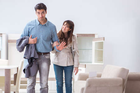 Married couple in the shop choosing furnitureの写真素材
