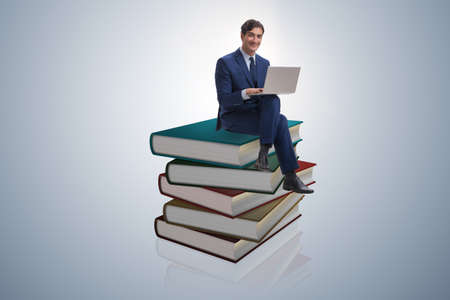 Businessman in executive distance learning conceptの写真素材