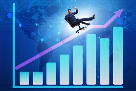 Businessman in economic growth conceptの写真素材