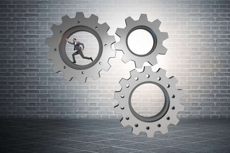 Teamwork concept with cogwheels and business peopleの写真素材