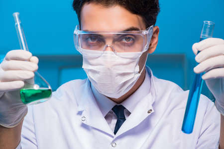 Chemistry assistant working in the chemical labの写真素材