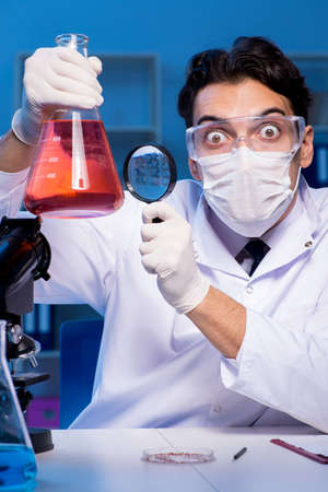 Chemistry assistant working in the chemical lab