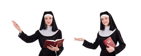 Young nun with bible isolated on whiteの写真素材