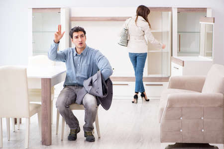 Married couple in the shop choosing furnitureの写真素材
