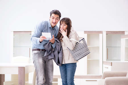 Married couple in the shop choosing furnitureの写真素材