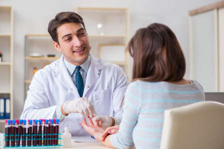 Patient during blood test sampling procedure taken for analysisの写真素材