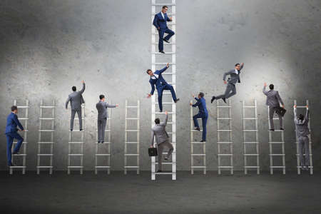 Competition concept with businessman beating competitorsの写真素材