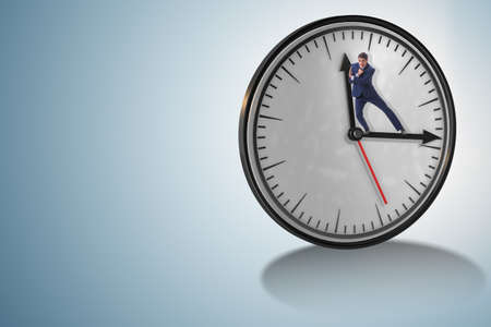 Businessman in time management conceptの写真素材