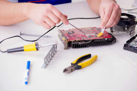 Computer hardware repair and fixing concept by experienced technician