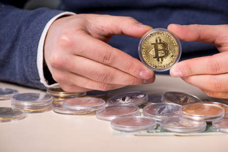 Young man in bitcoin mining concept