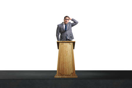 Man businessman making speech at rostrum in business conceptの写真素材