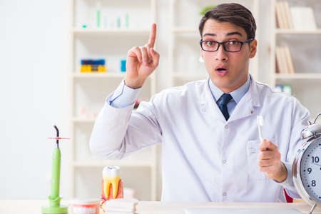Young dentist working in the dentistry hospitalの写真素材