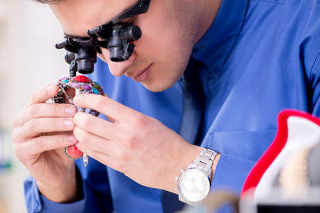 Jeweler working with luxury jewelry in the workshop