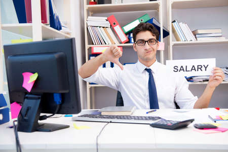 Busy frustrated businessman angry in the officeの写真素材